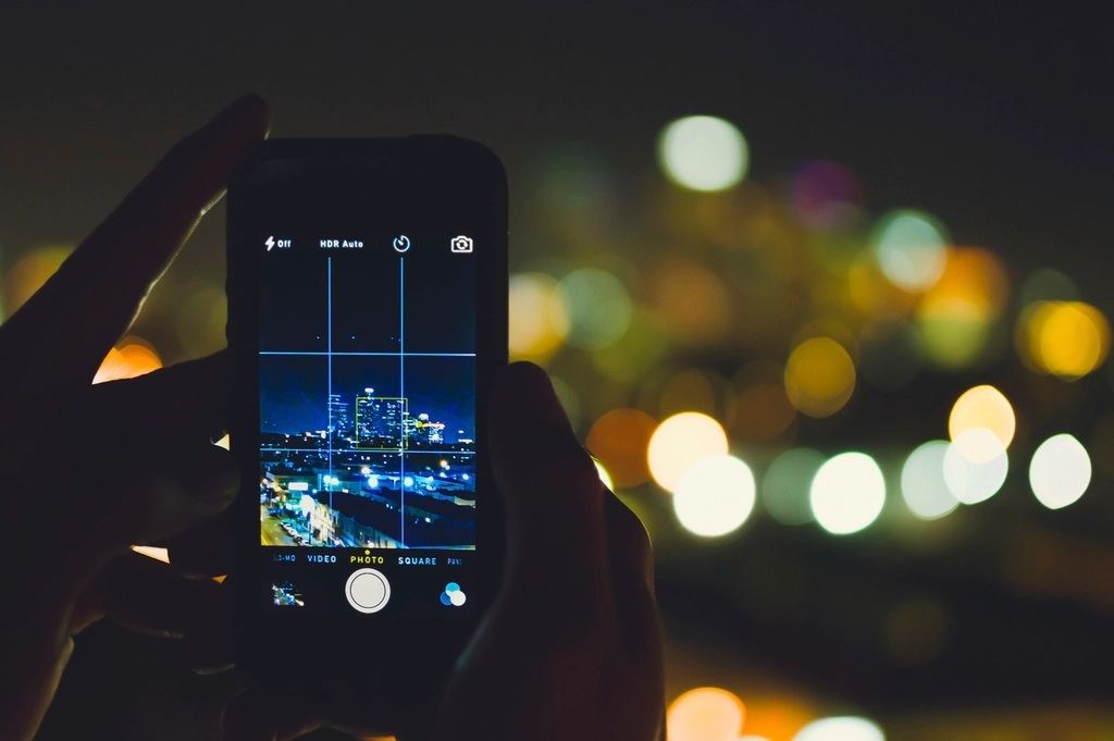 Smartphone screen showing a live night-time camera view